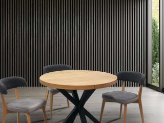 okrągły stół rozkładany na metalowych nogach z drewnianymi krzesłami tapicerowanymi